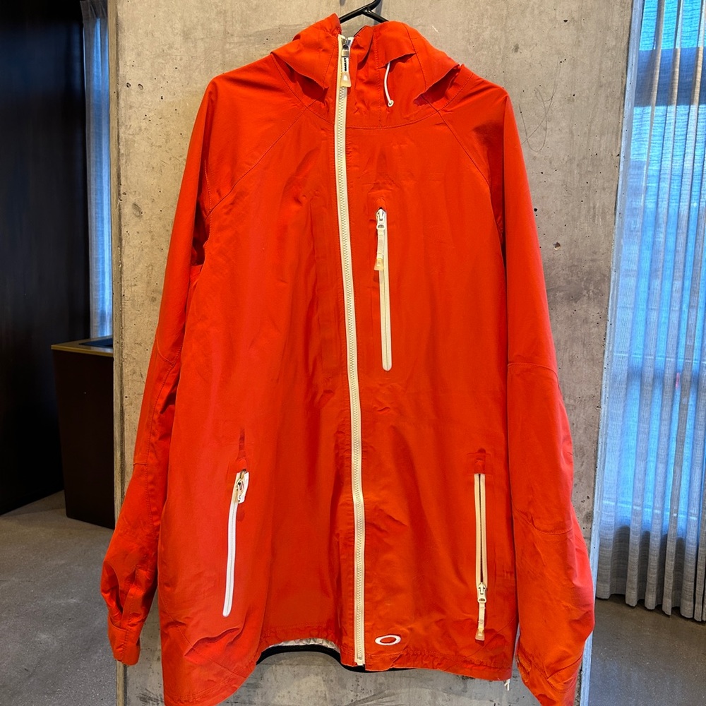 Oakley Anorak (long) Waterproof Jacket XL Mens. Diagonal zip.